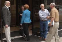 Former oil company executive relegated to greeter
