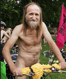 Randy Hoiklinker, riding his bike to a nudist bake sale