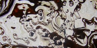 Engineer discovers Coca Cola neutralizes soil contamination